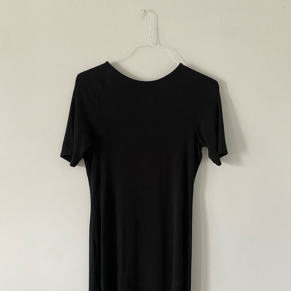 H&M black above the knee dress in size M.